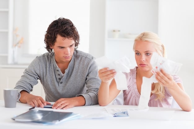 A family sitting at a table, reviewing financial documents and possibly discussing taxes, conveying the real-life impact of tax policies on household financial well-being