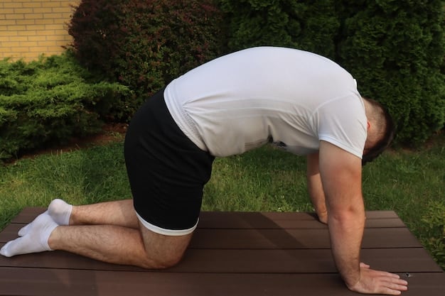 A person performing a cat-cow yoga pose to stretch their back muscles. The image highlights the spinal articulation, emphasizing flexibility and fluid movement.