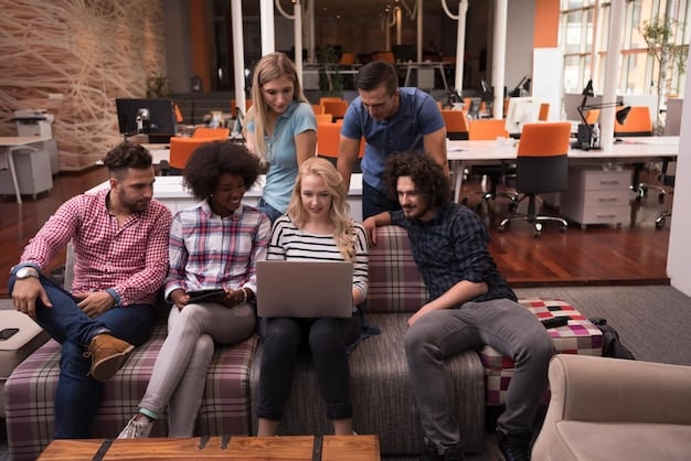 A communal workspace in a co-living facility, featuring several individuals working on laptops at large tables. The atmosphere is collaborative and well-lit, with bookshelves and plants adding to the aesthetic.